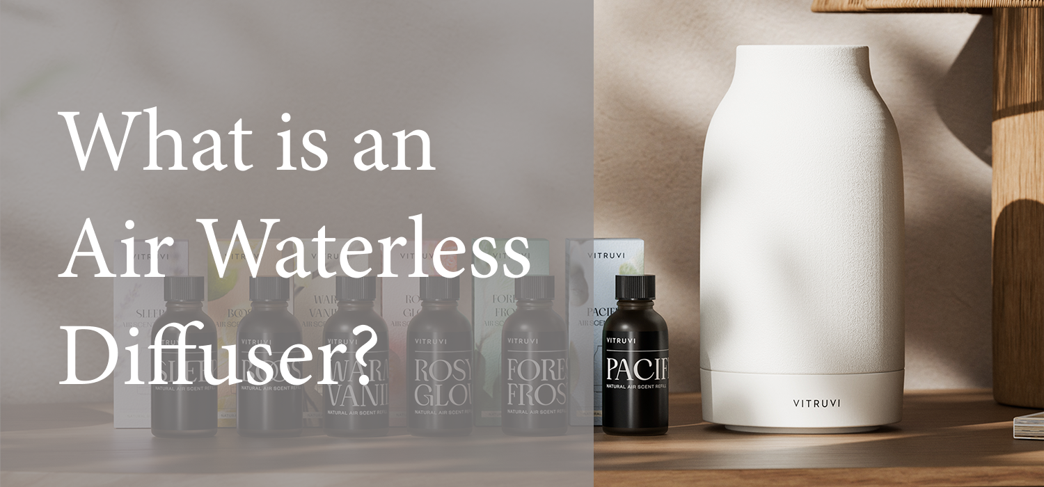 [What is an Air Waterless Diffuser] layered over an image of a ceramic white Vitruvi Air Waterless Diffuser next to 3 scent bottles